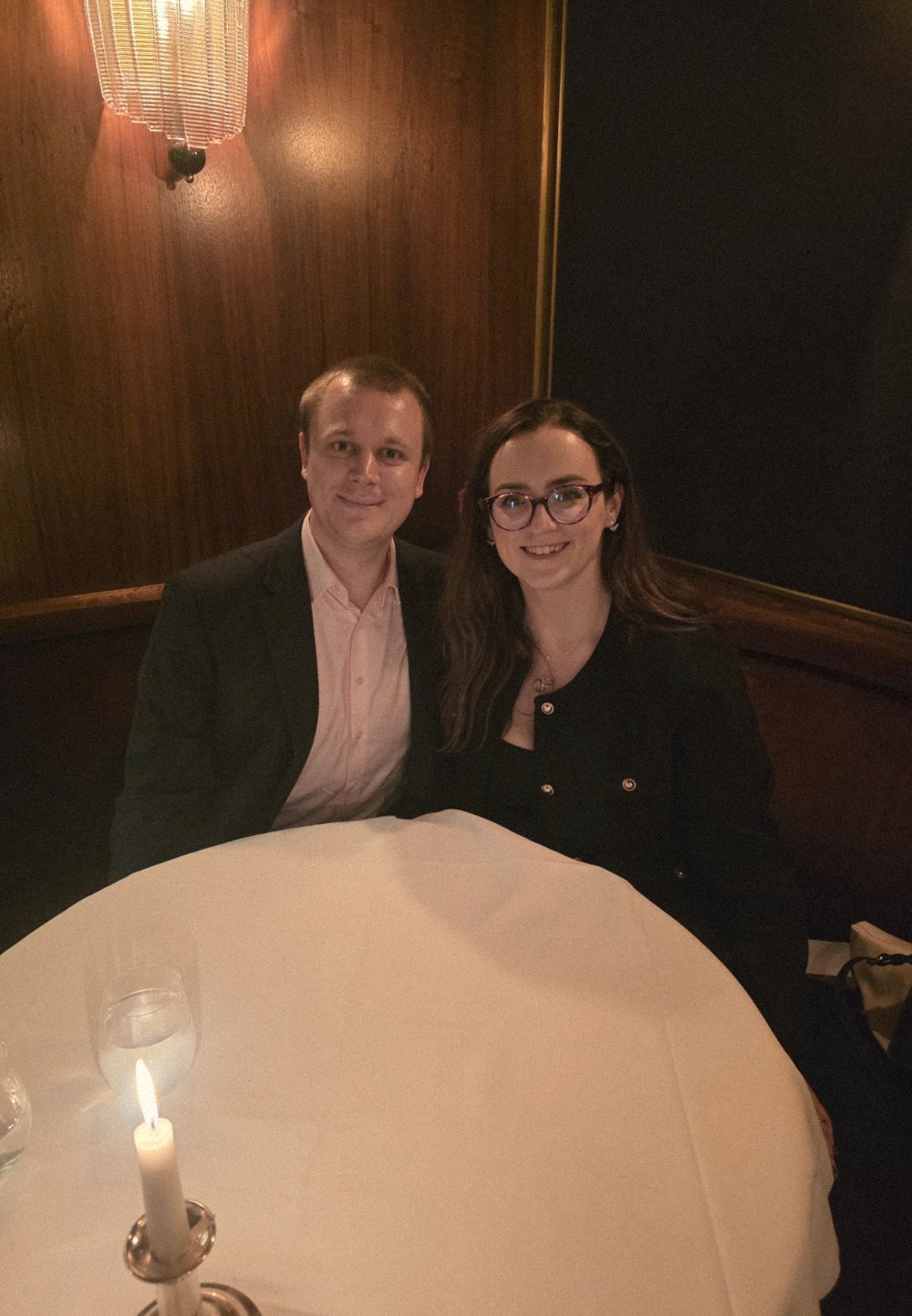 Evelina and Michael at a candlelit table